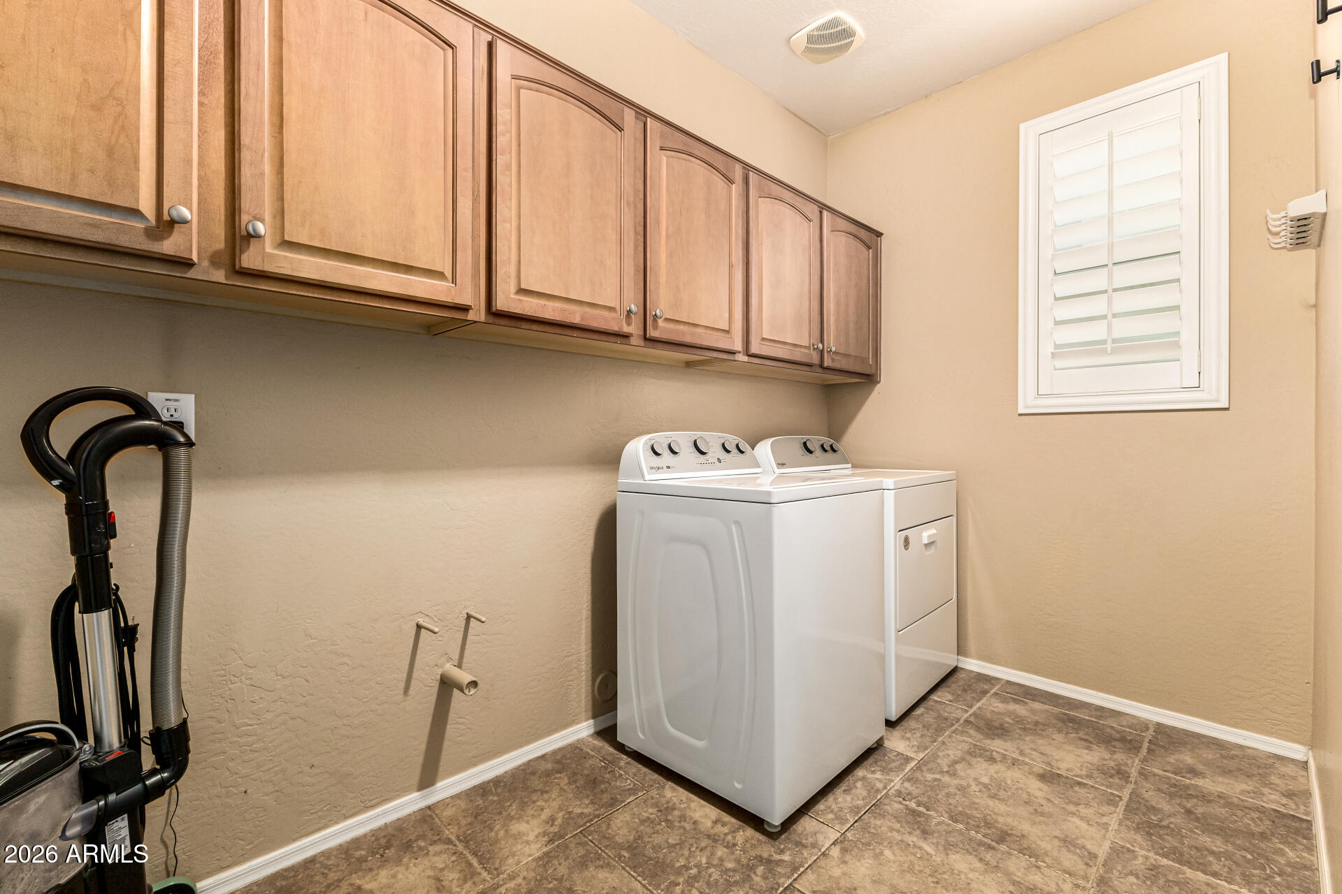 2858 East Shannon Street Gilbert, AZ 85295 - Photo 29 of 35 a utility room with dryer and washer