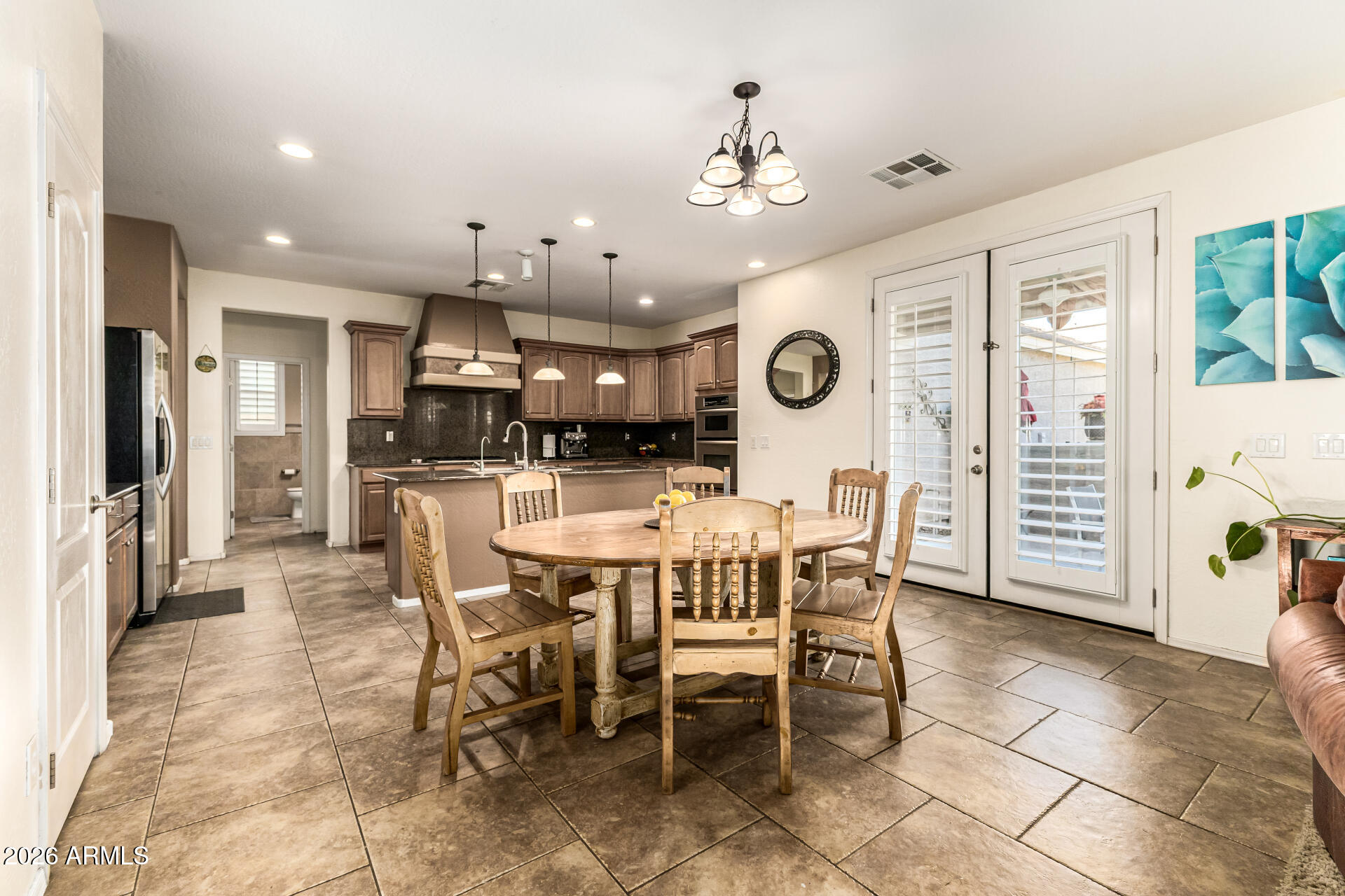 2858 East Shannon Street Gilbert, AZ 85295 - Photo 7 of 35 a view of a dining area with furniture