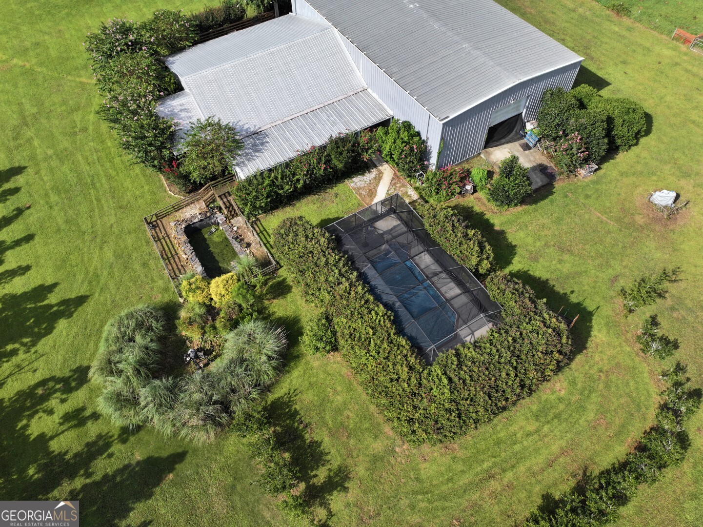 10537 Cedar Springs Road Blakely, GA 39823 - Photo 1 of 1 an aerial view of a house with a yard basket ball court and outdoor seating