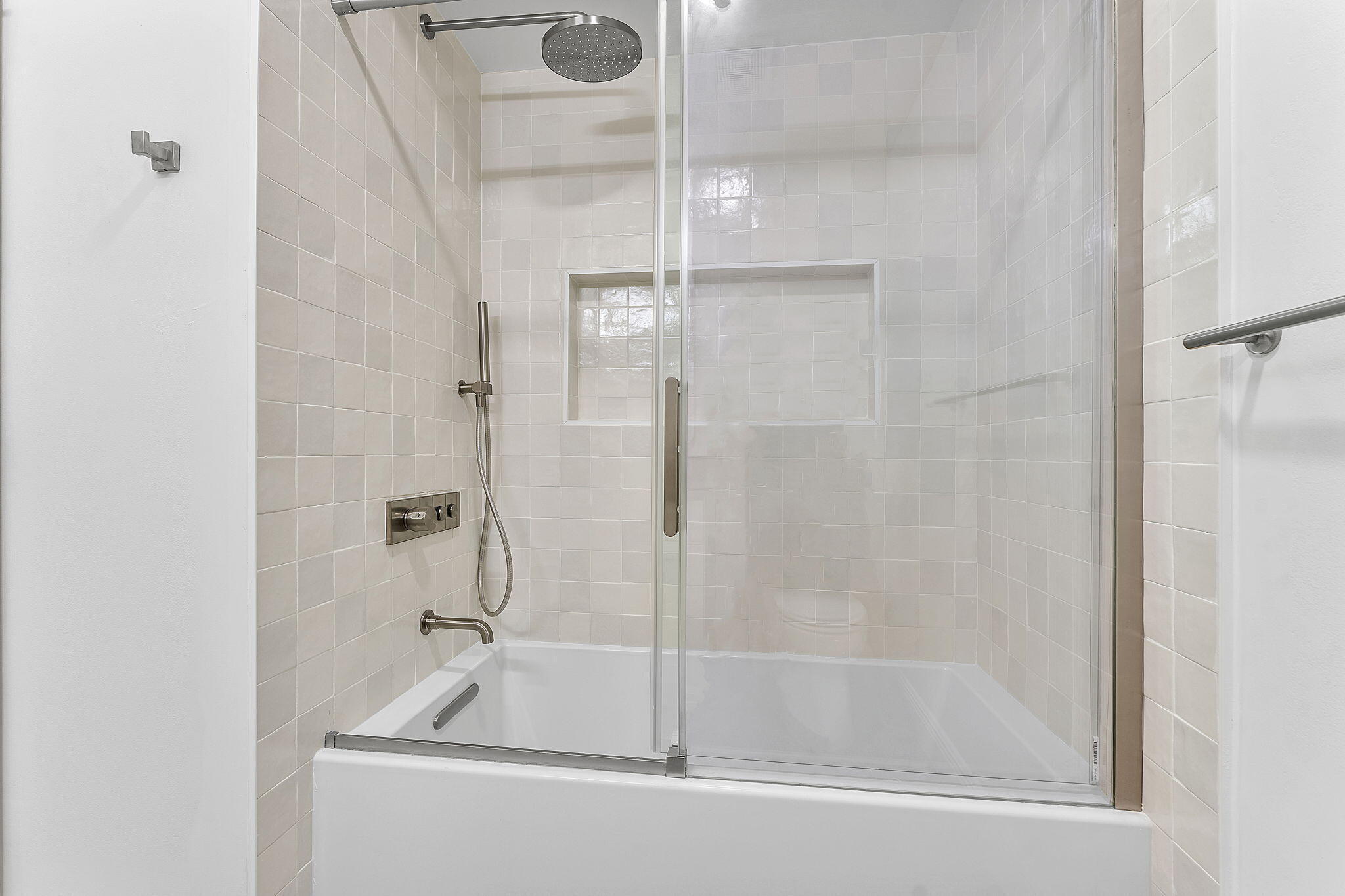 9180 Pine Springs Drive Boca Raton, FL 33428 - Photo 23 of 29 a bathroom with a tub