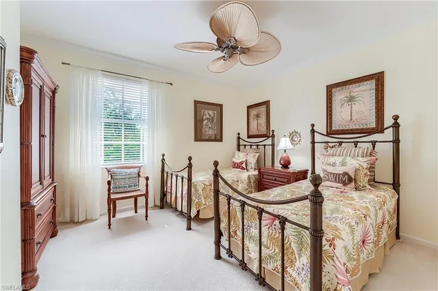 a bedroom with furniture and a window