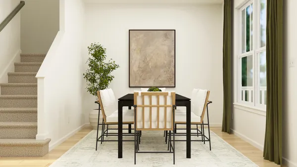 a balcony with table and chairs