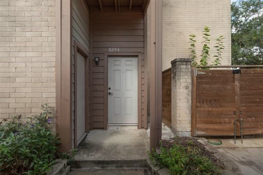 8293 Sands Point Drive, Unit 185 Houston, TX 77036 - Photo 1 of 20 a view of a brick house with a door