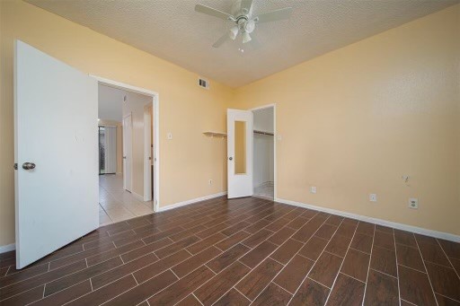 8293 Sands Point Drive, Unit 185 Houston, TX 77036 - Photo 12 of 20 a view of an empty room with wooden floor