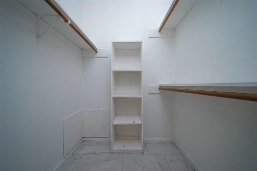 8293 Sands Point Drive, Unit 185 Houston, TX 77036 - Photo 13 of 20 a view of an empty walk in closet