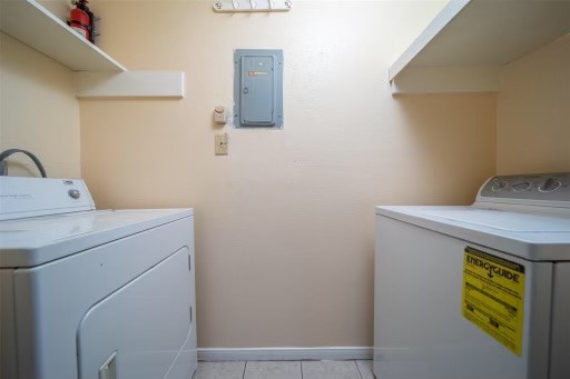 8293 Sands Point Drive, Unit 185 Houston, TX 77036 - Photo 15 of 20 a utility room with dryer and washer