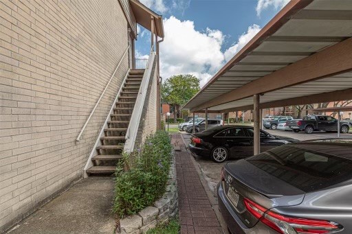 8293 Sands Point Drive, Unit 185 Houston, TX 77036 - Photo 19 of 20 a car parked in front of a house