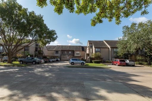 8293 Sands Point Drive, Unit 185 Houston, TX 77036 - Photo 20 of 20 a view of a street with cars on road