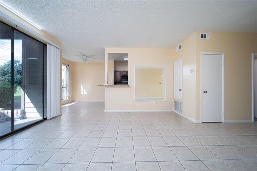 8293 Sands Point Drive, Unit 185 Houston, TX 77036 - Photo 5 of 20 a view of a big room with wooden floor and a bathroom