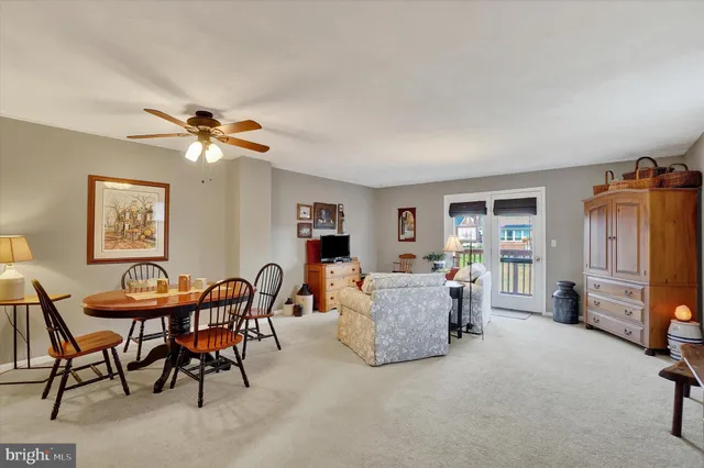 a view of a livingroom with furniture and a chandelier