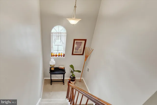 a workspace with furniture window and wooden floor