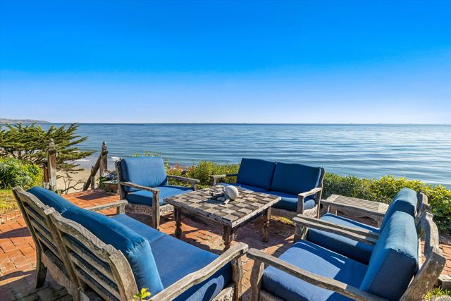 a view of a outdoor seating area with furniture