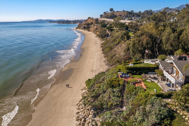 a view of a lake with a mountain in front of it