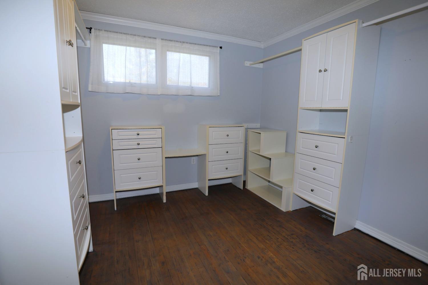 121 Washington Road Princeton, NJ 08540 - Photo 20 of 43 a room with a dresser and a window