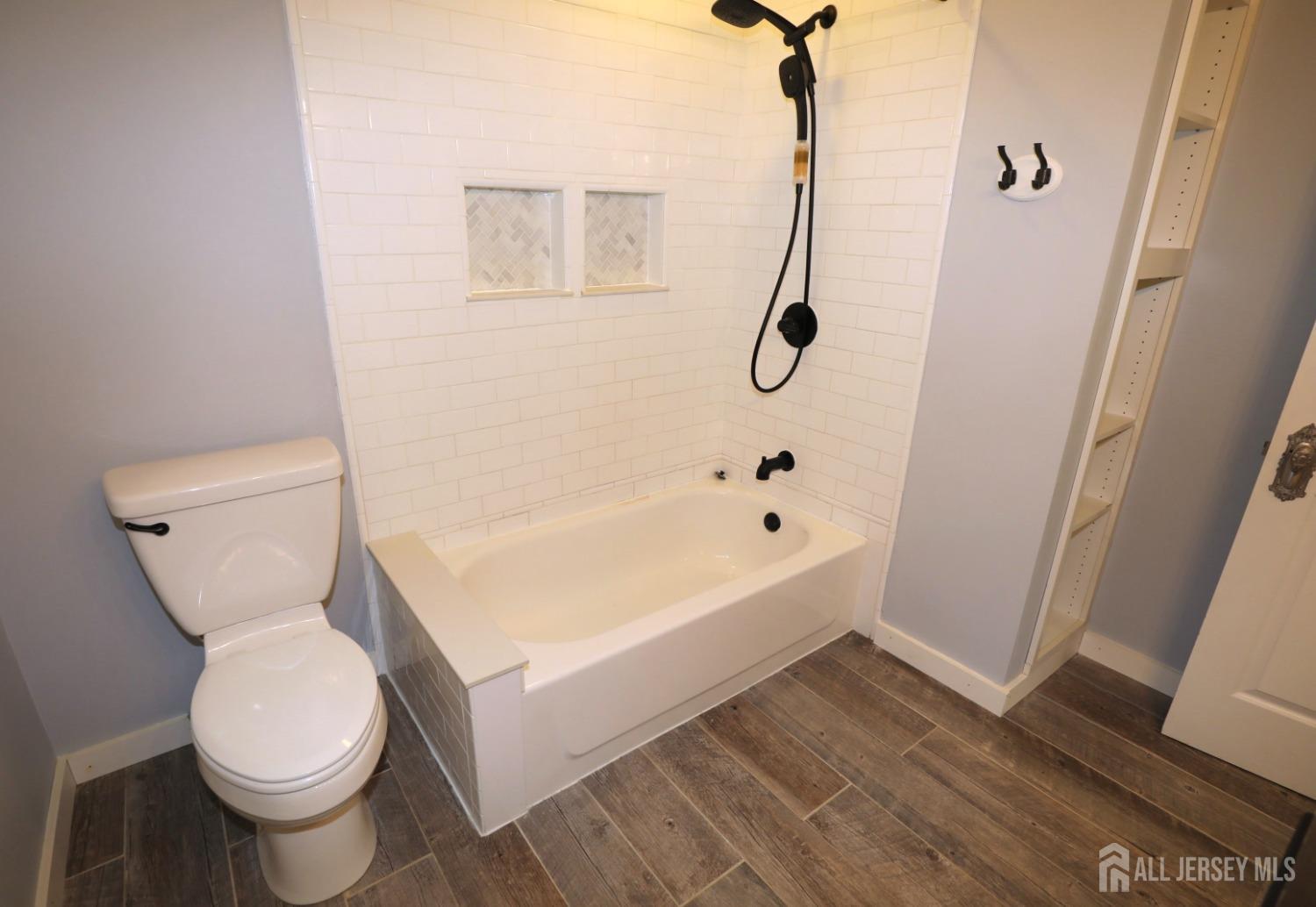 121 Washington Road Princeton, NJ 08540 - Photo 23 of 43 a bathroom with a toilet and a shower