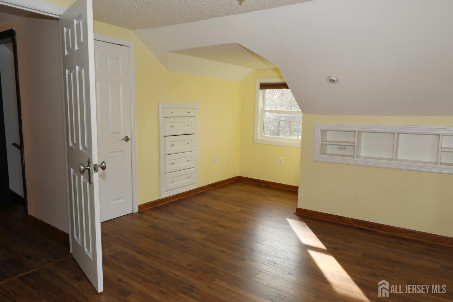 121 Washington Road Princeton, NJ 08540 - Photo 29 of 43 a view of a hallway with wooden floor