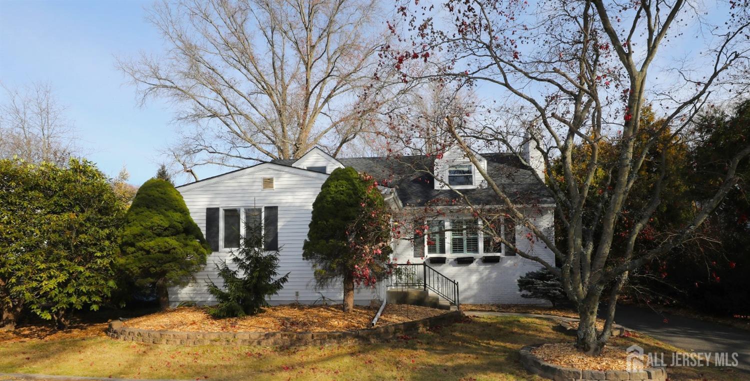 121 Washington Road Princeton, NJ 08540 - Photo 3 of 43 a front view of a house with a yard