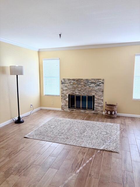 43376 Cook Street, Unit 87 Palm Desert, CA 92211 - Photo 10 of 35 a view of empty room with wooden floor and fireplace