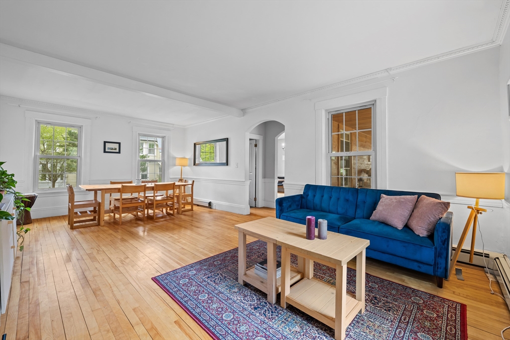 10 Maple Street Sturbridge, MA 01566 - Photo 11 of 40 a living room with furniture and wooden floor