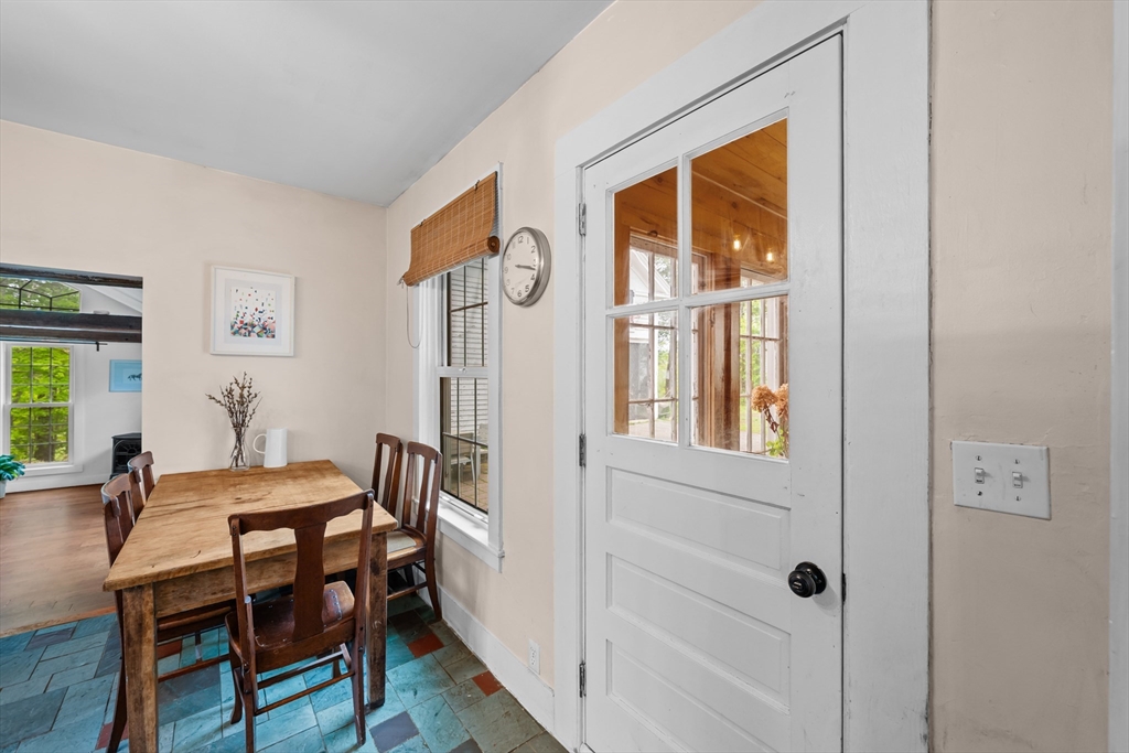 10 Maple Street Sturbridge, MA 01566 - Photo 17 of 40 a dining room with furniture and window