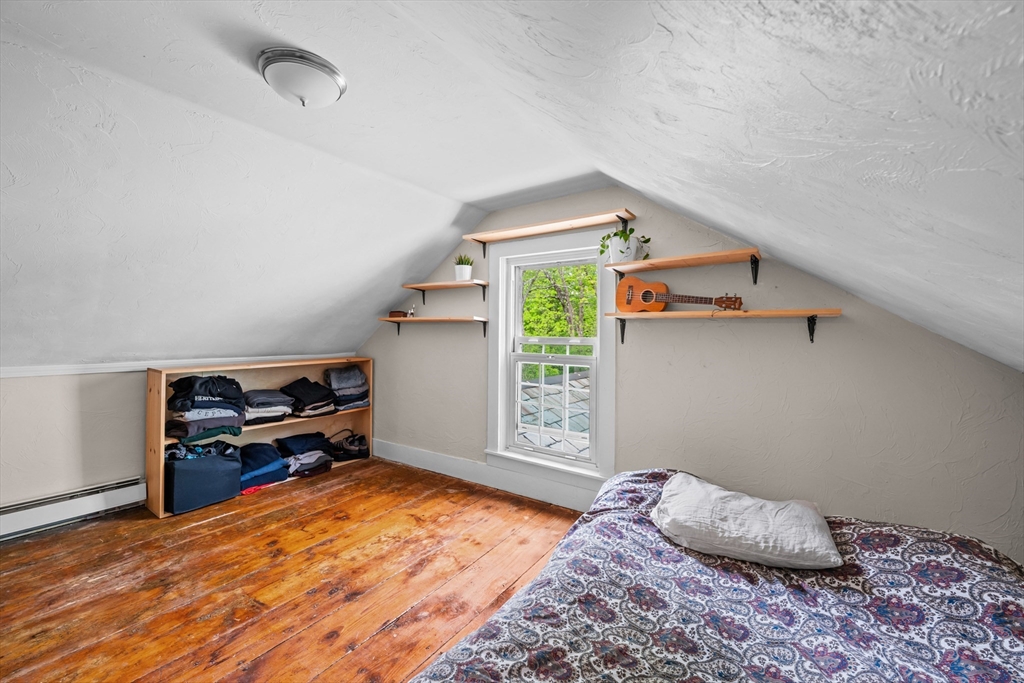 10 Maple Street Sturbridge, MA 01566 - Photo 32 of 40 a bedroom with a bed and a window