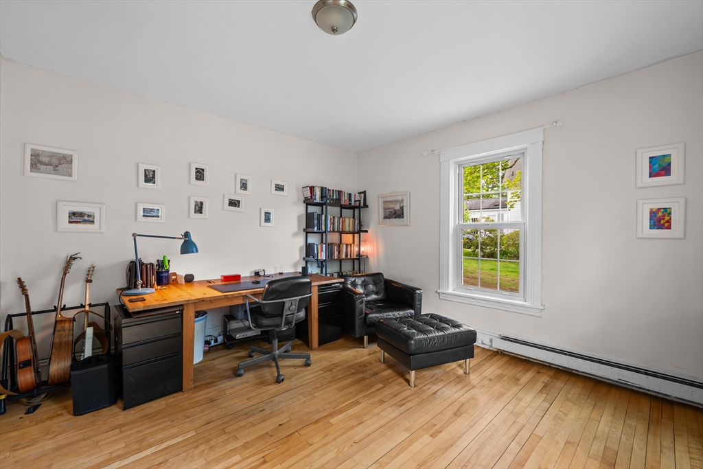 10 Maple Street Sturbridge, MA 01566 - Photo 7 of 40 a room with furniture and wooden floor