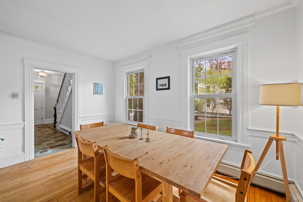 10 Maple Street Sturbridge, MA 01566 - Photo 8 of 40 a view of a dining room with furniture window and wooden floor