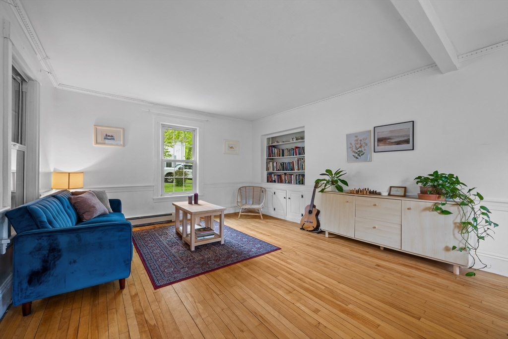 10 Maple Street Sturbridge, MA 01566 - Photo 9 of 40 a living room with furniture and wooden floor