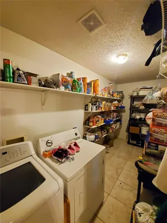 a storage room with storage and utility