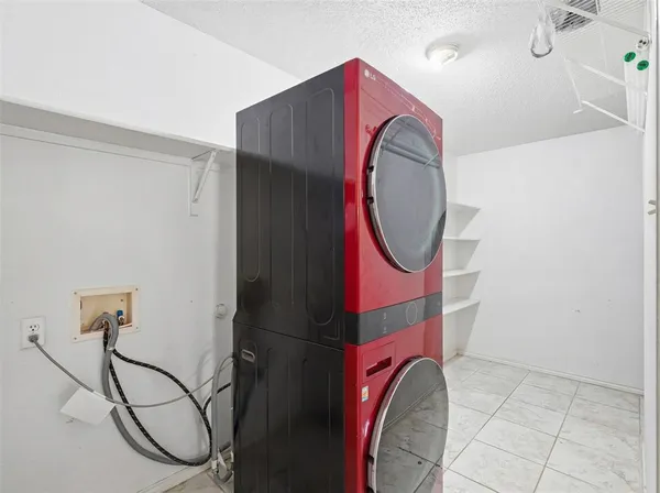a view of staircase with washer and dryer