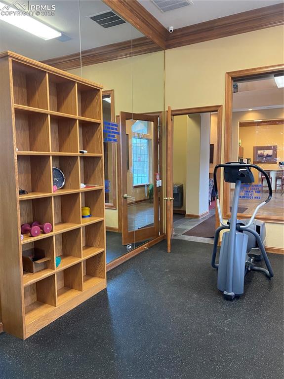 3715 Riviera Grove, Unit 201 Colorado Springs, CO 80922 - Photo 30 of 32 a view of room with furniture and windows