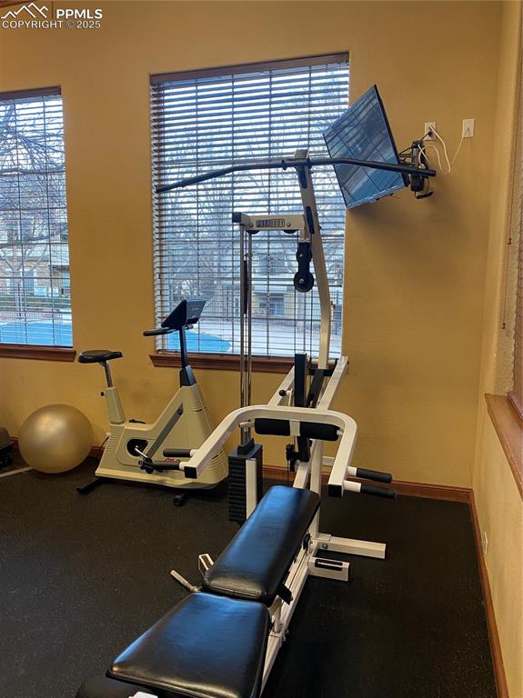 3715 Riviera Grove, Unit 201 Colorado Springs, CO 80922 - Photo 32 of 32 a view of a room with gym equipment