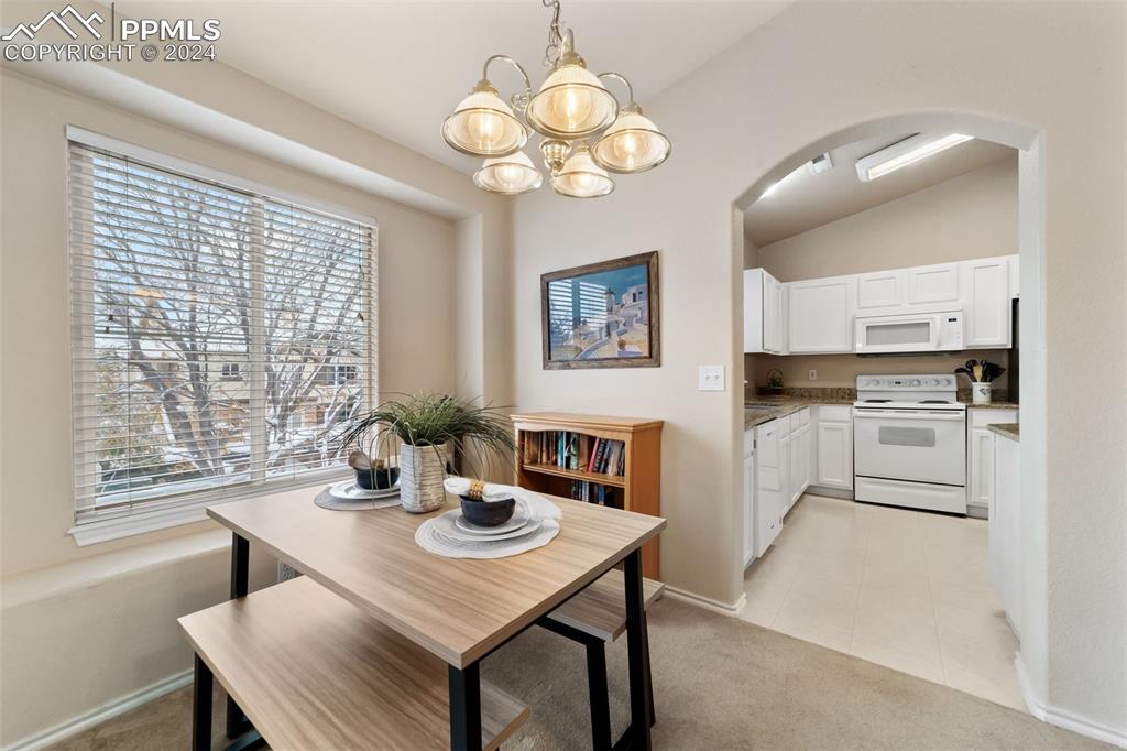 3715 Riviera Grove, Unit 201 Colorado Springs, CO 80922 - Photo 5 of 32 a view of a dining room and livingroom view