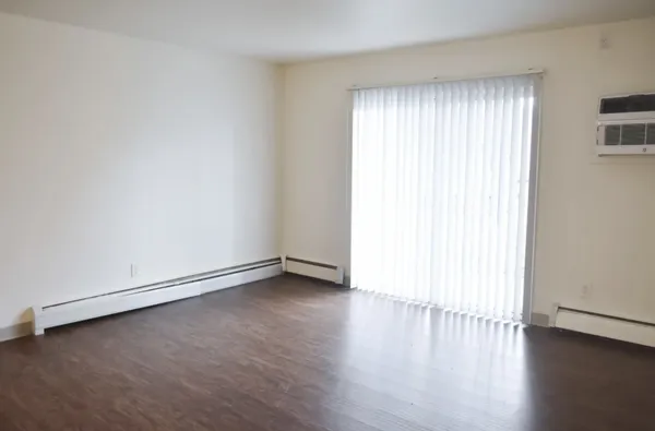 a kitchen with a sink and a refrigerator