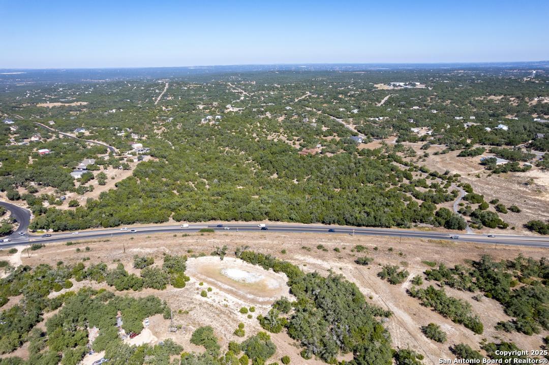 0 State Hwy 46 W Spring Branch, TX 78070 - Photo 16 of 27 an aerial view of residential houses with outdoor space