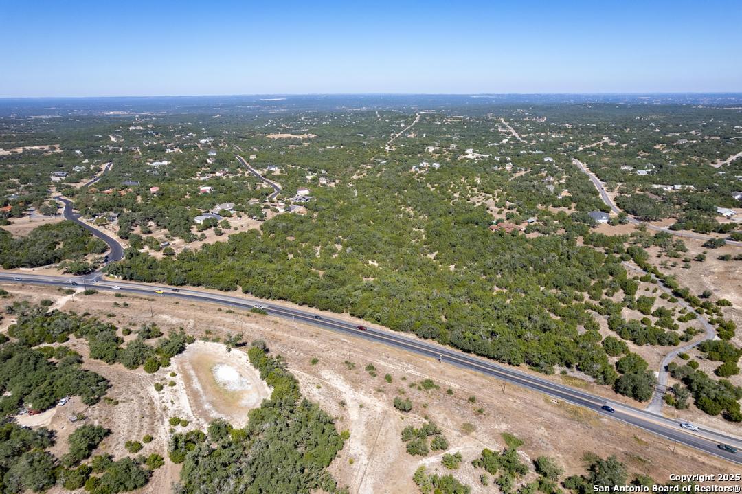 0 State Hwy 46 W Spring Branch, TX 78070 - Photo 17 of 27 an aerial view of residential houses with city view