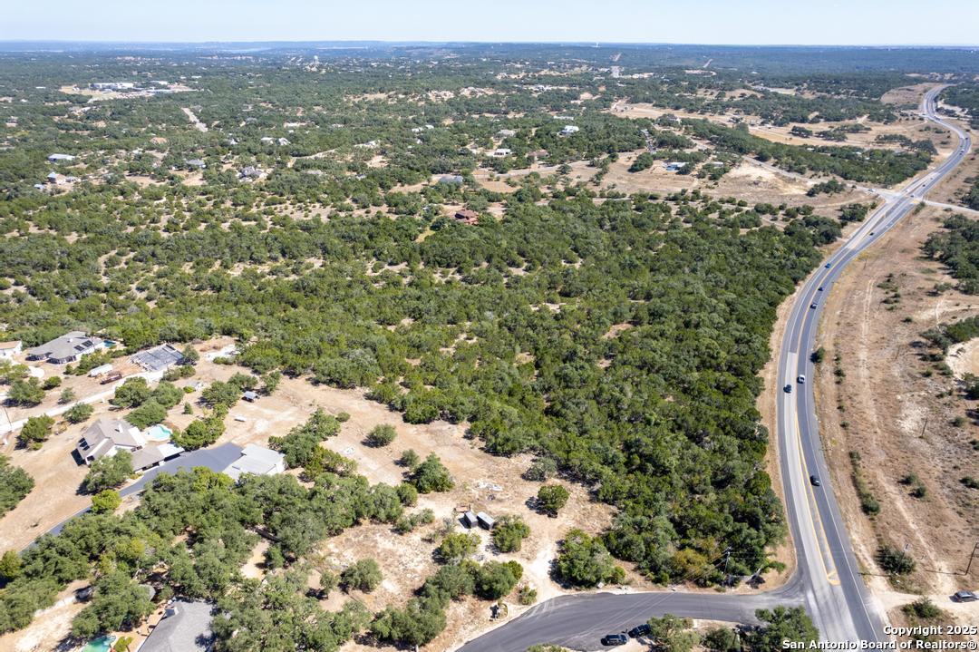0 State Hwy 46 W Spring Branch, TX 78070 - Photo 27 of 27 an aerial view of a house with a yard