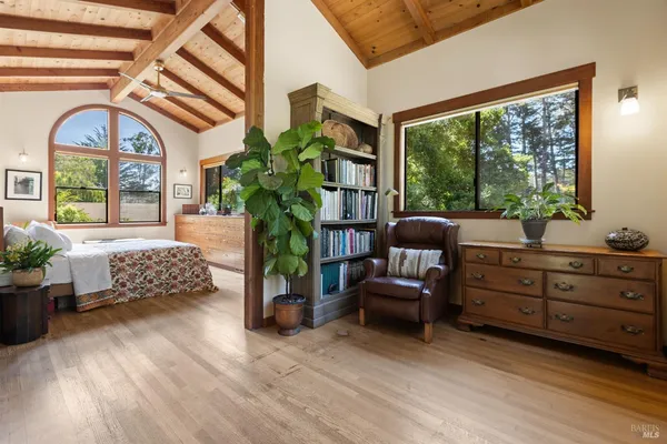 a room with furniture and a large window