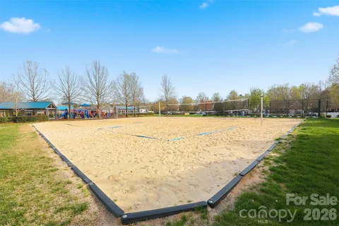 a view of swimming pool with an outdoor space and seating area