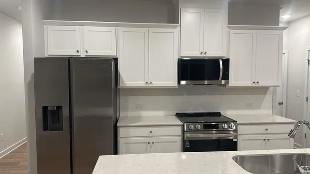 a bathroom with a bathtub and a sink