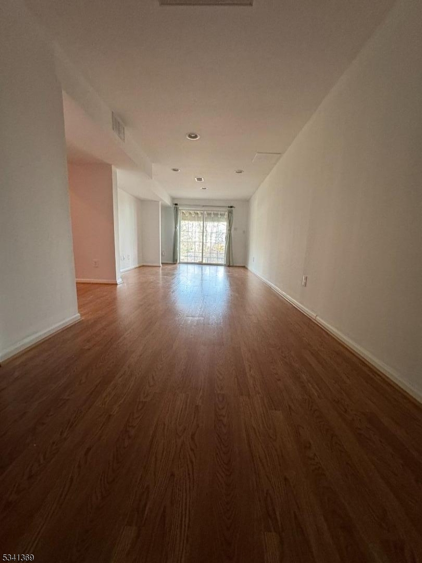 10 Hopkinson Court Bernards, NJ 07920 - Photo 15 of 17 a view of a room with wooden floor and window