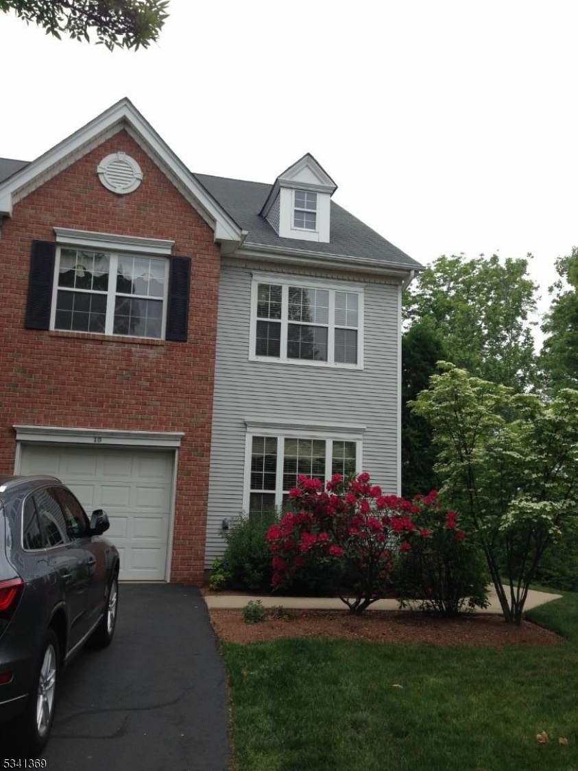 10 Hopkinson Court Bernards, NJ 07920 - Photo 17 of 17 a front view of a house with a garden
