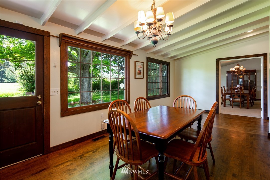 5413 Barr Road Ferndale, WA 98248 - Photo 18 of 40 a view of a dining room with furniture window and wooden floor