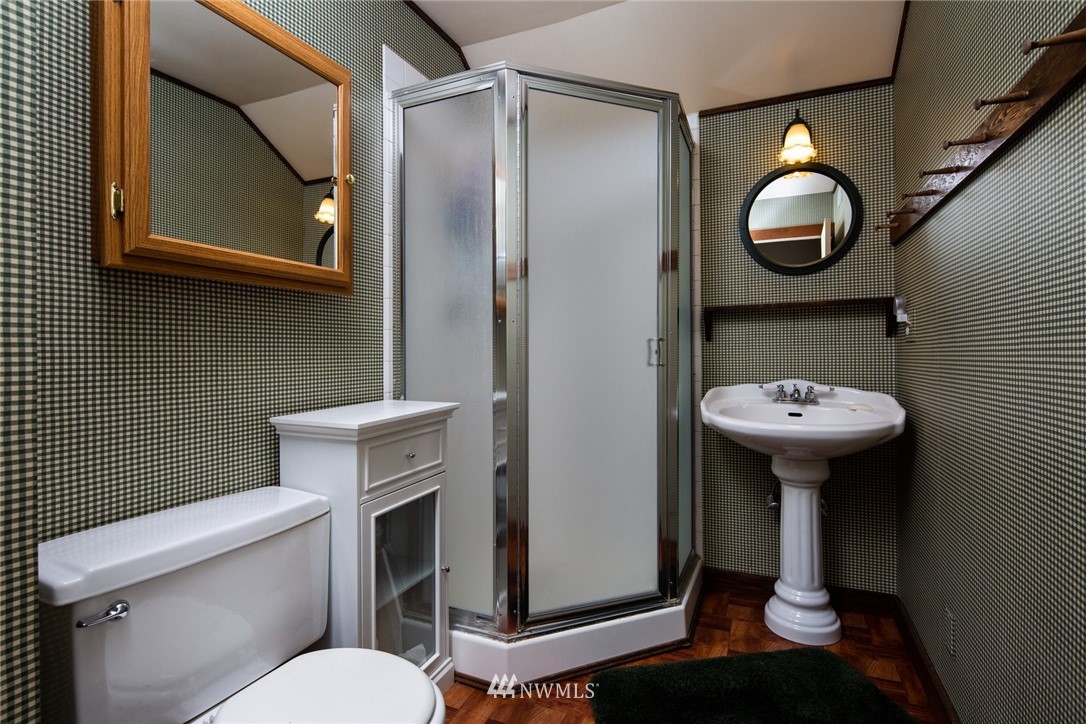 5413 Barr Road Ferndale, WA 98248 - Photo 29 of 40 a bathroom with a toilet sink and mirror