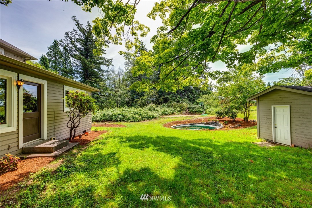 5413 Barr Road Ferndale, WA 98248 - Photo 34 of 40 a view of backyard with swimming pool