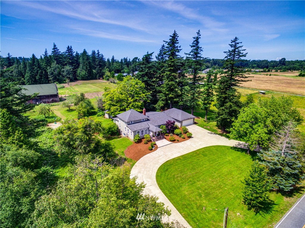 5413 Barr Road Ferndale, WA 98248 - Photo 40 of 40 an aerial view of a house with a garden and lake view