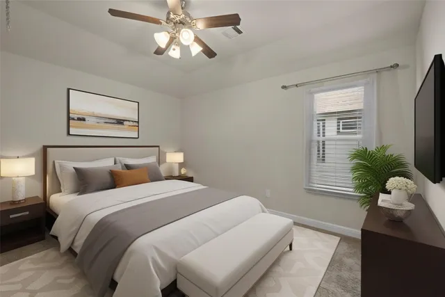 a bedroom with a large bed and a window