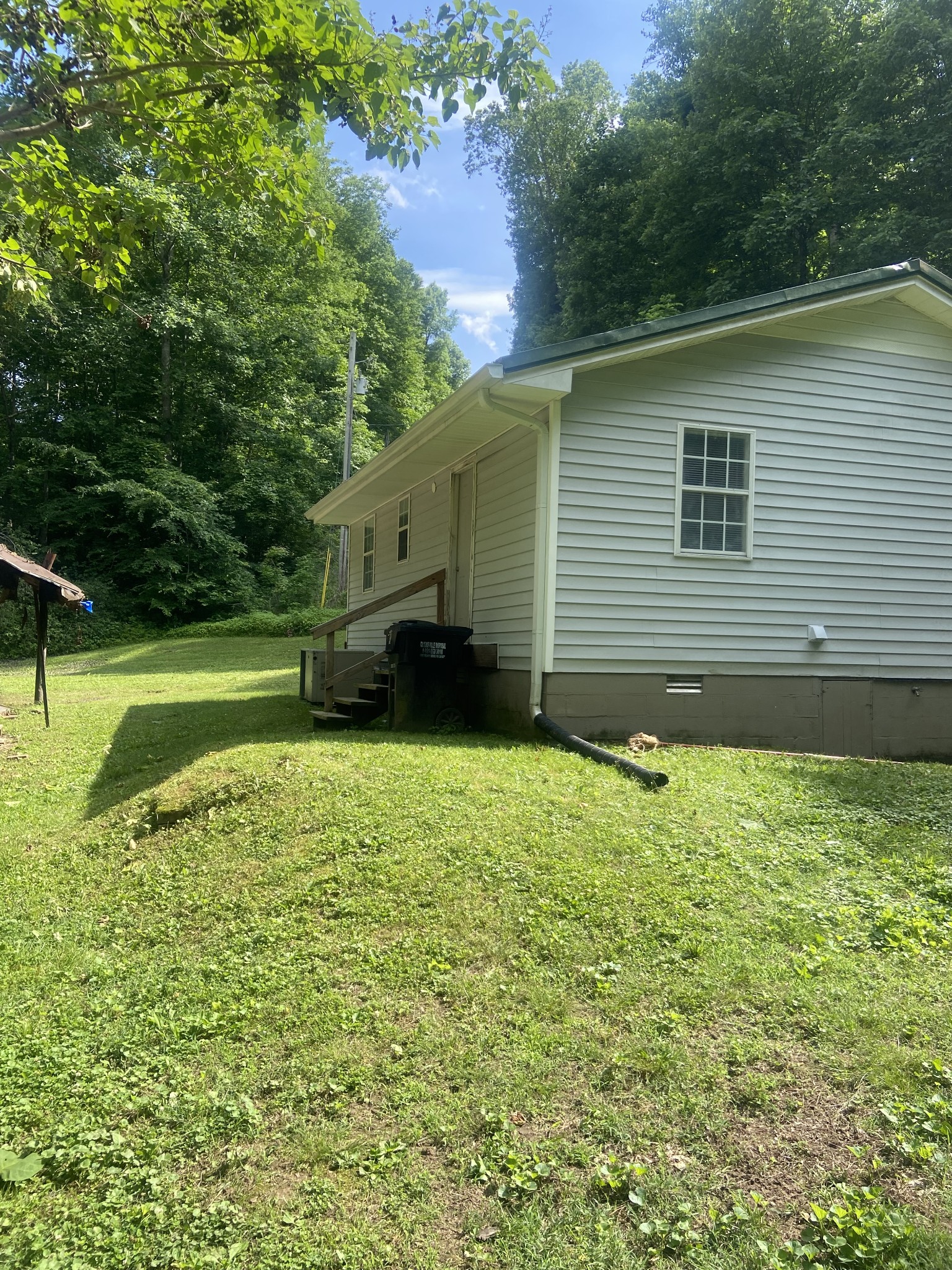 2750 Lyle Hollow Road Palmyra, TN 37142 - Photo 6 of 9 a backyard of a house with lots of green space