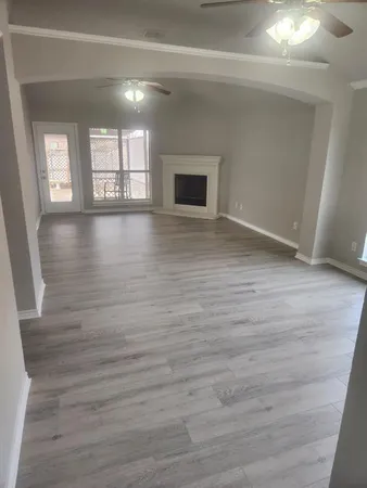 a view of livingroom with hardwood floor and window