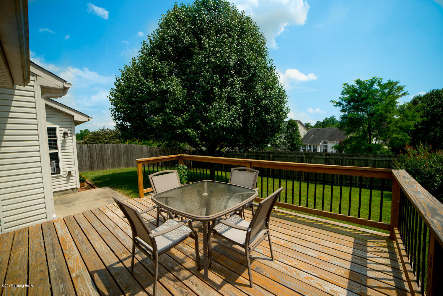 17520 Curry Branch Road Louisville, KY 40245 - Photo 33 of 45 Conveniently step from the Kitchen and living area to the outdoor space with a generous sized deck to enjoy the outdoors